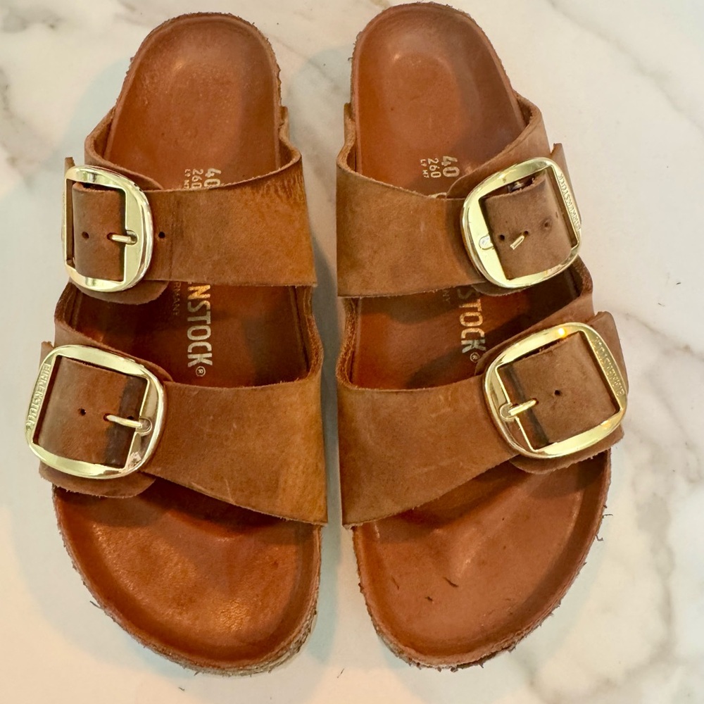 Gently worn, Birkenstock women’s Tan Sandals with Gold Buckles